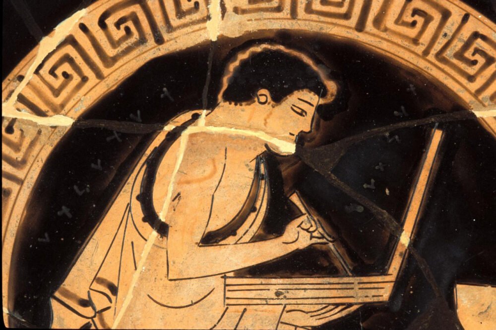 boy studying, education in ancient greece